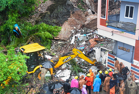 Rescue work underway after a house collapsed due to heavy rainfall, at Moghalrajpuram in Vijayawada, Saturday, Aug. 31, 2024. At least one person was killed in the incident, according to officials.